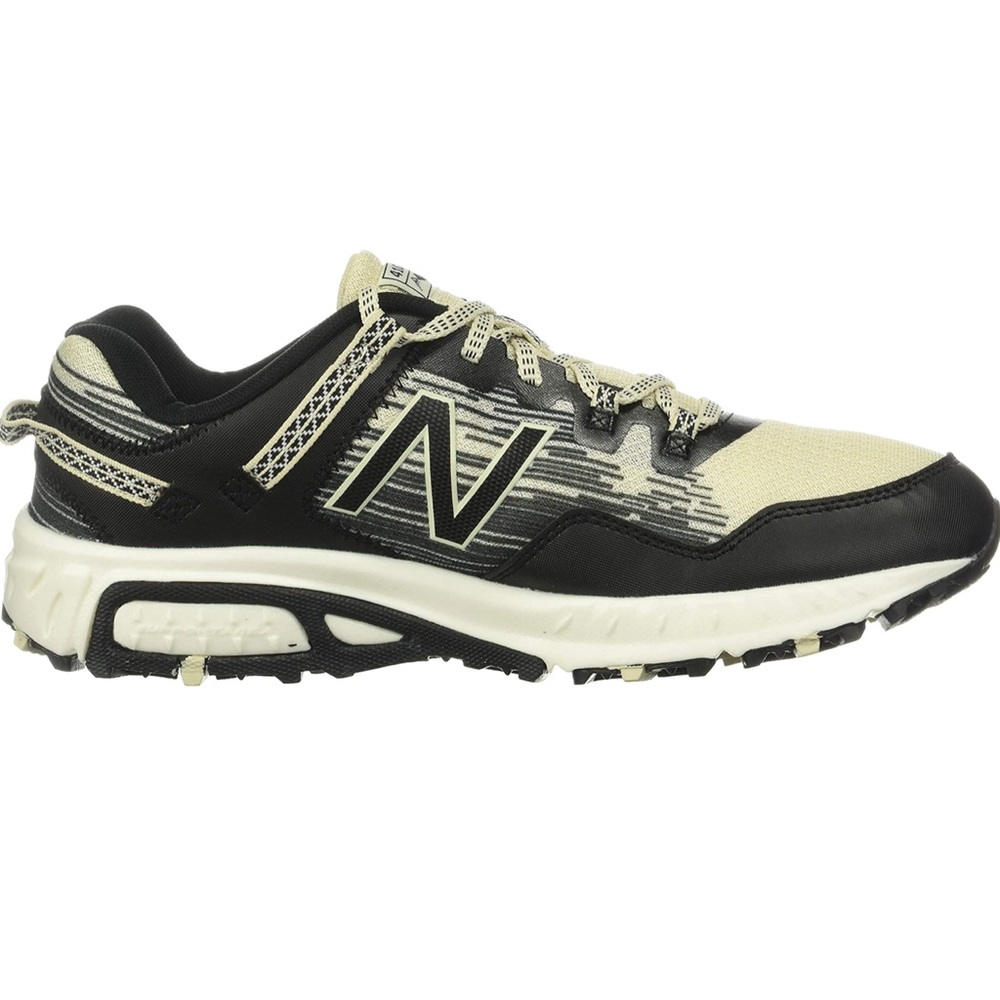 New balance 410 v6.  Black and white NWOT. Size 10.5